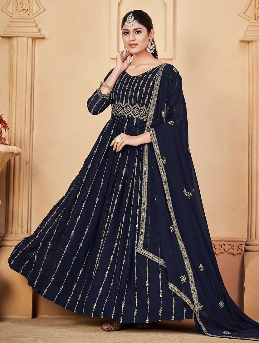 women solid with work semi stitched suit set