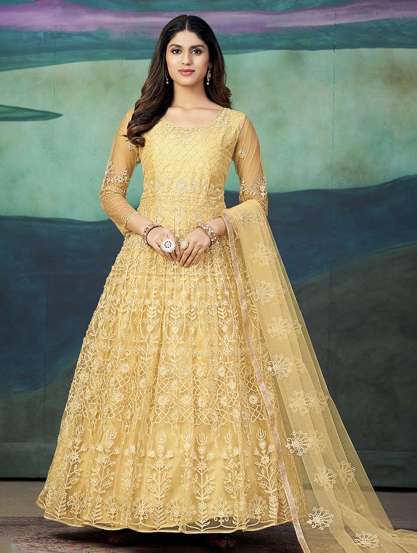 women solid with work semi stitched suit set