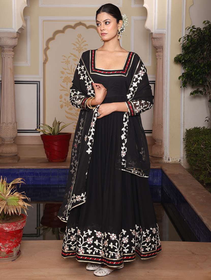 women solid with work unstitched suit