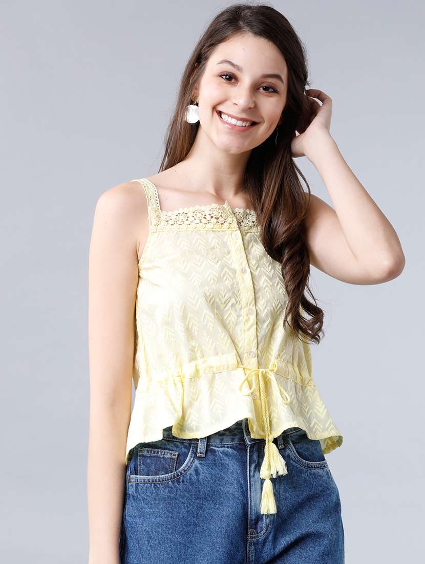 women solid  yellow cotton blend regular top