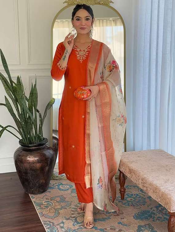women orange kurta dupatta set