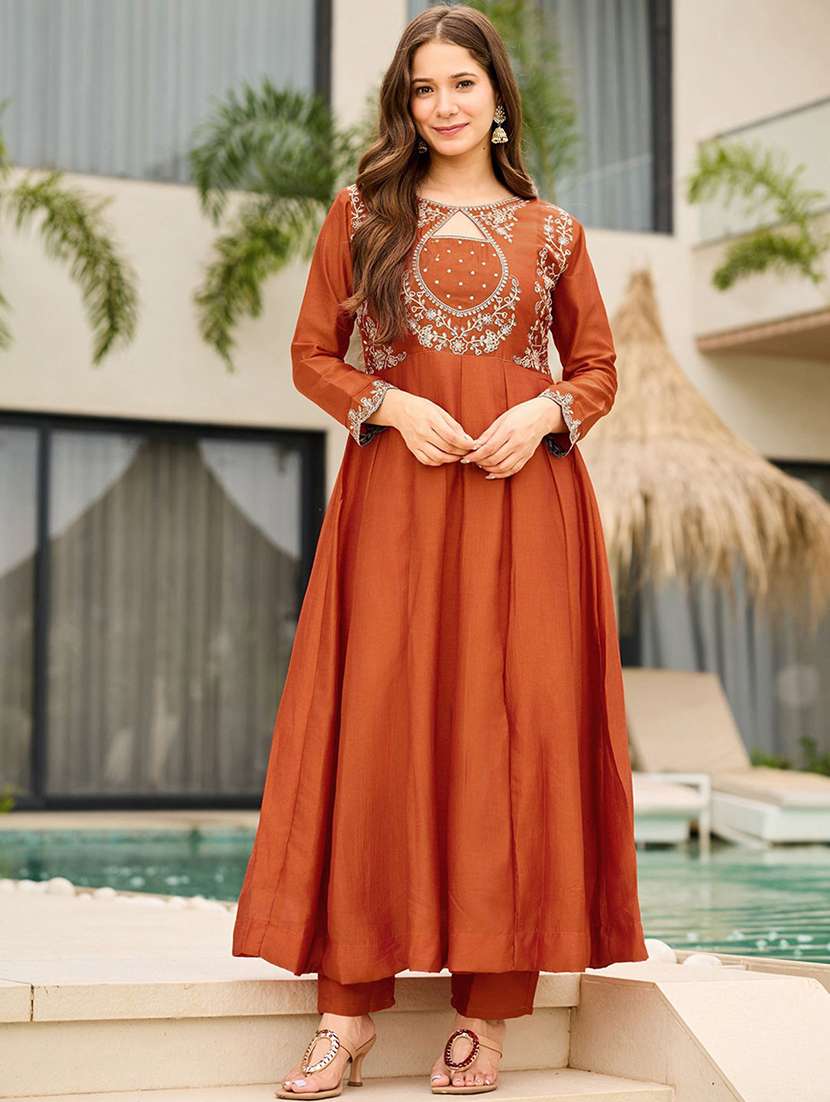 women orange kurta pant set