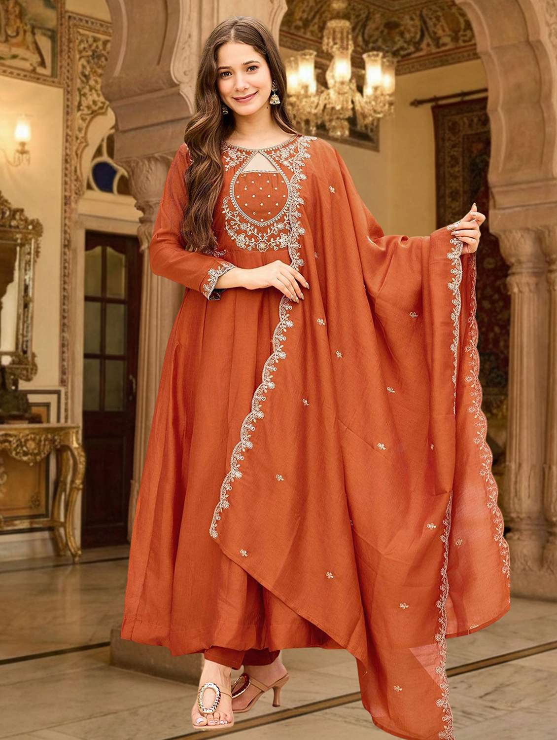 women self design rust suit set