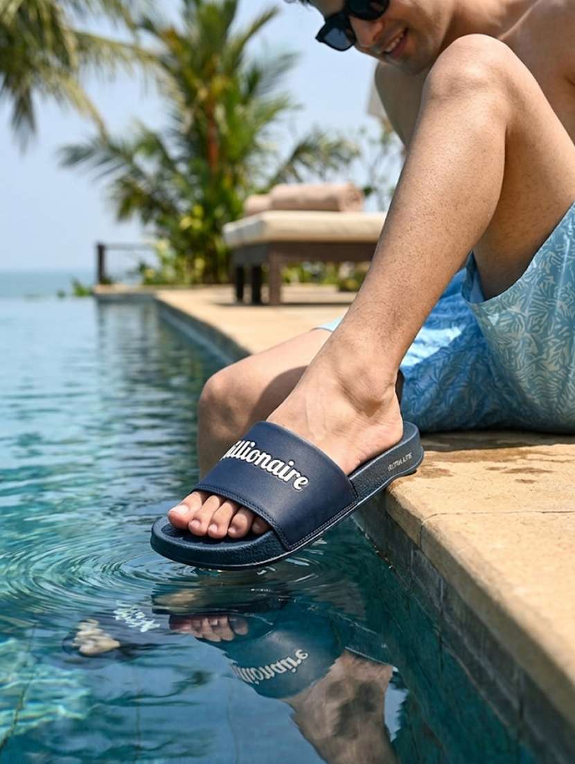 men solid blue slider - 22472830 -  Standard Image - 1