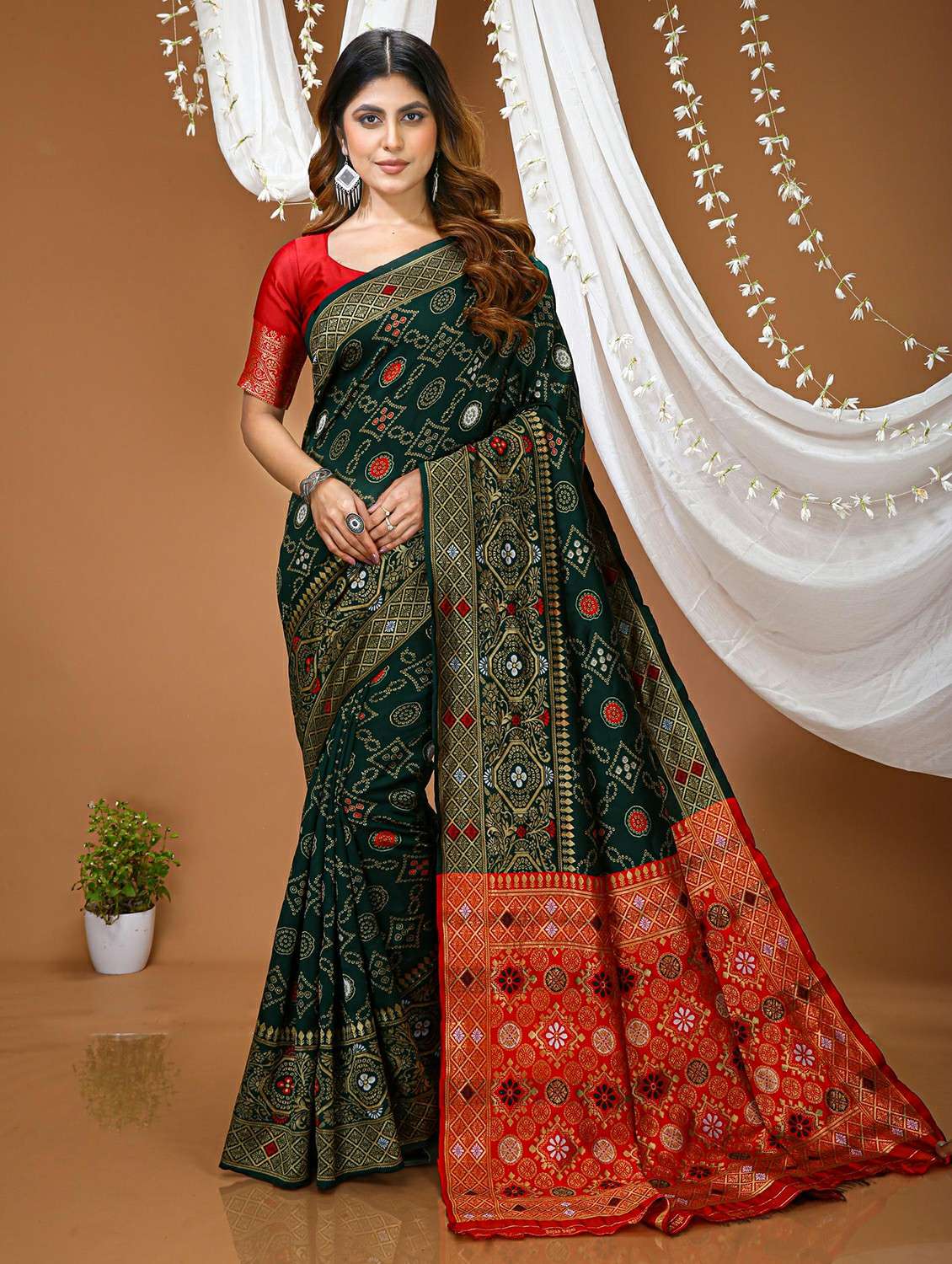 women green kanjivaram saree with blouse