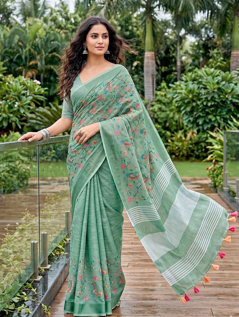 women solid with work embroidered saree with blouse