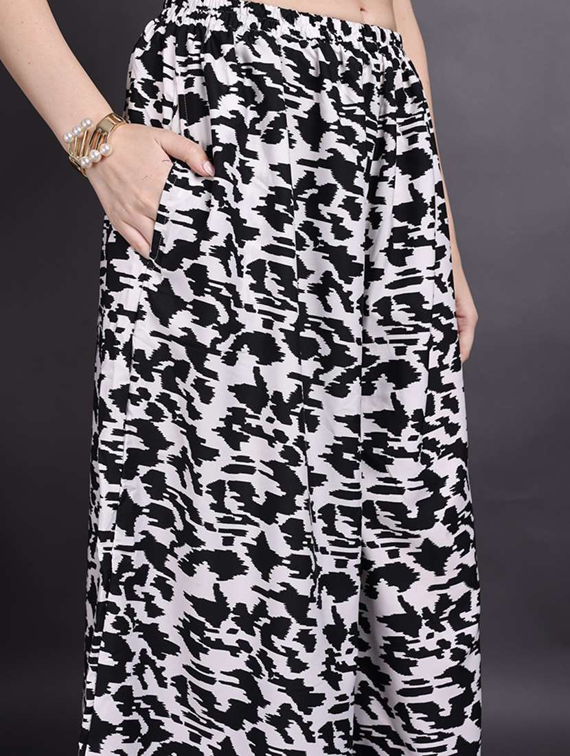women printed mid rise flared palazzo - 22498063 -  Standard Image - 1