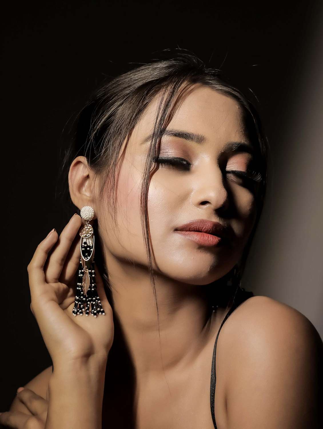 brass metal & beaded tassel earring - 22498082 -  Standard Image - 4