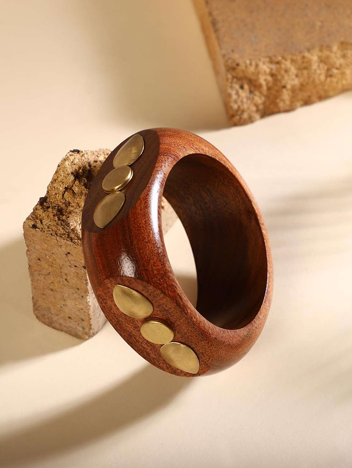 brown wood bracelet with gold stud embellishments