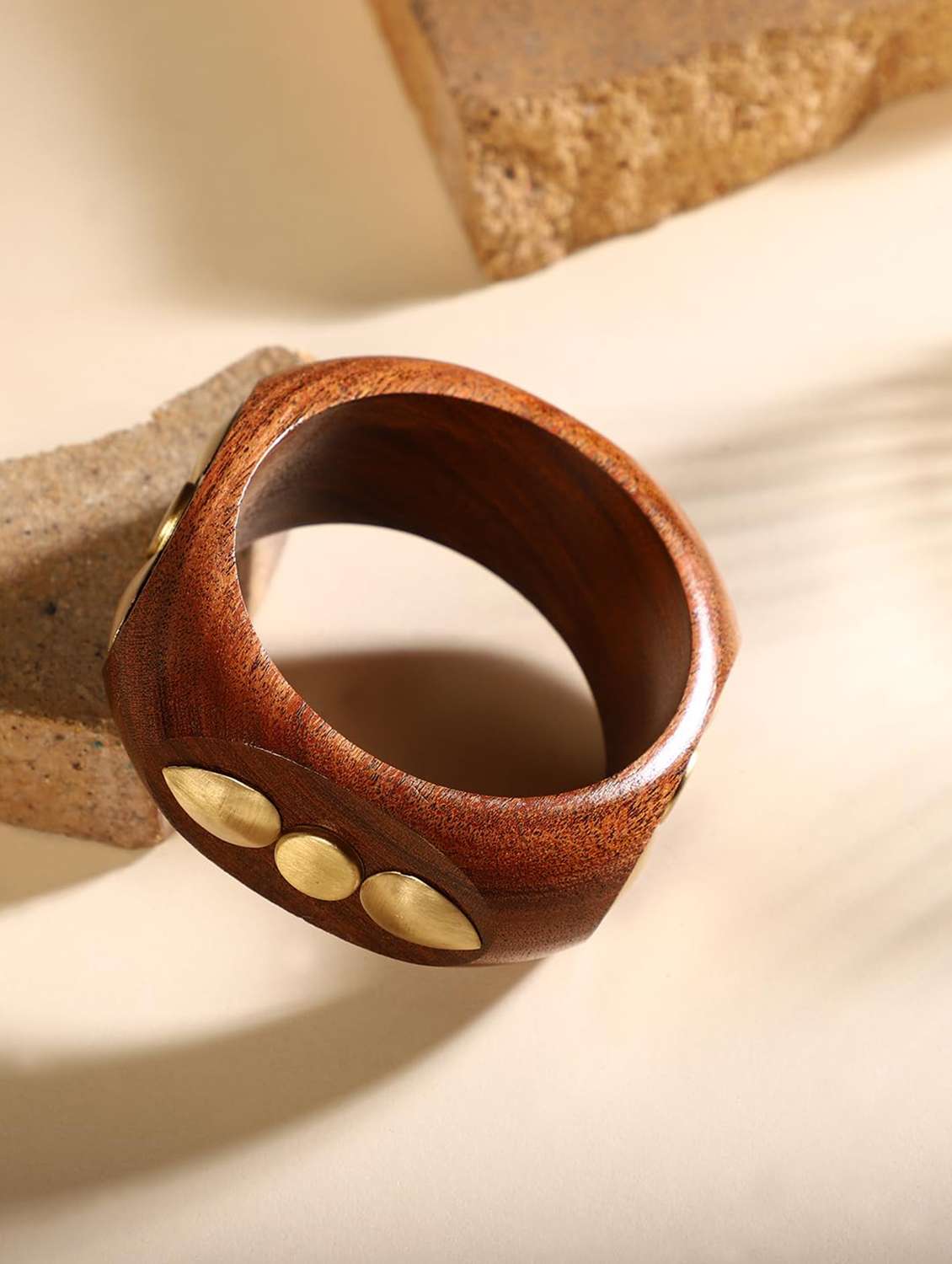 brown wood bracelet with gold stud embellishments - 22498173 -  Standard Image - 1