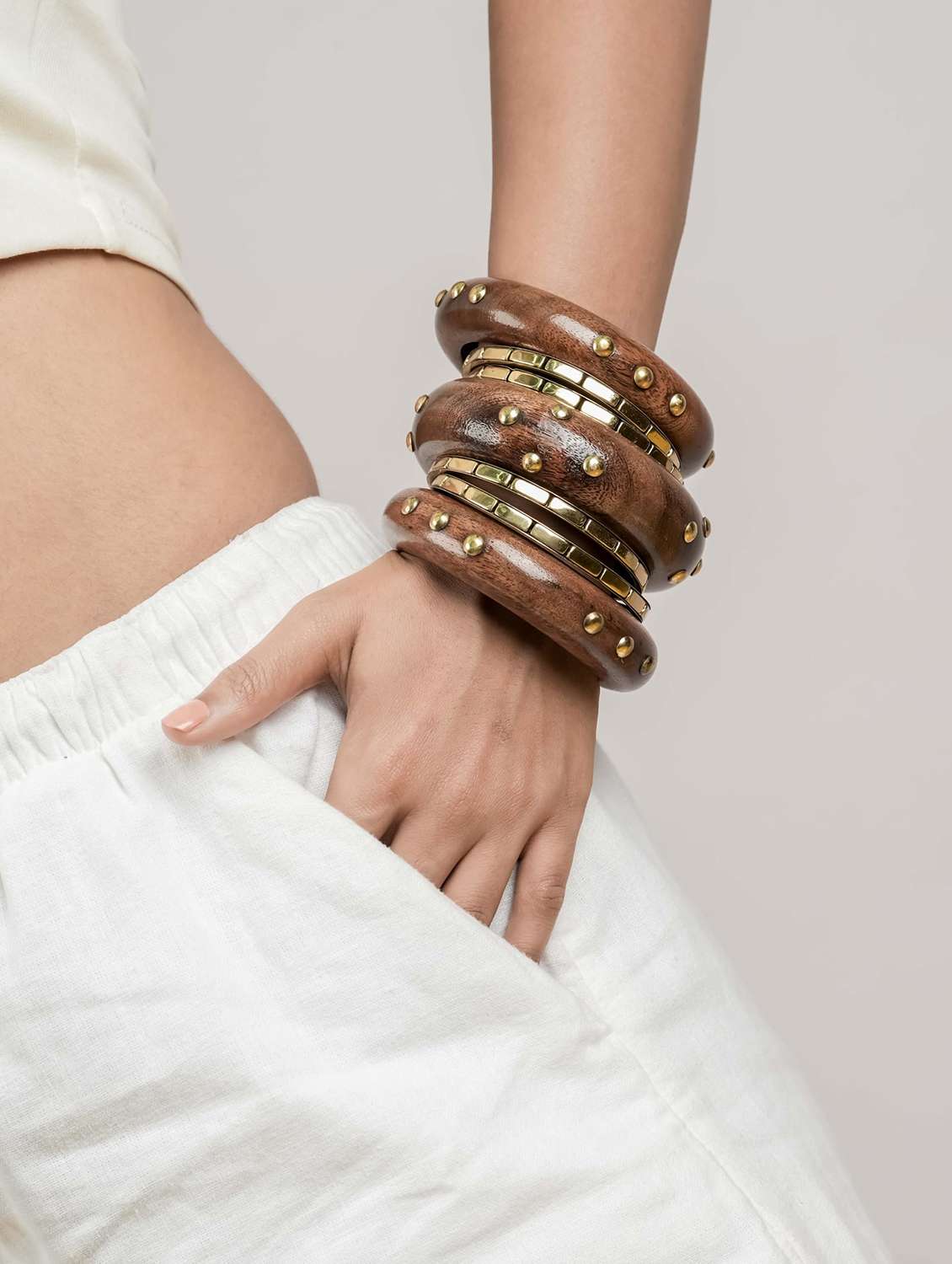 handcrafted brown wood bangles with metal detailing (set of 7) - 22498198 -  Standard Image - 4