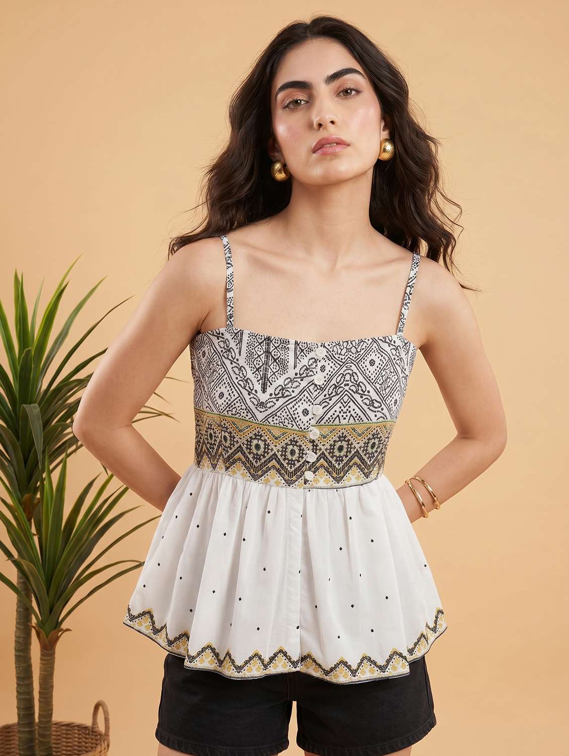 women embroidered sleeveless peplum top - 22498697 -  Standard Image - 1