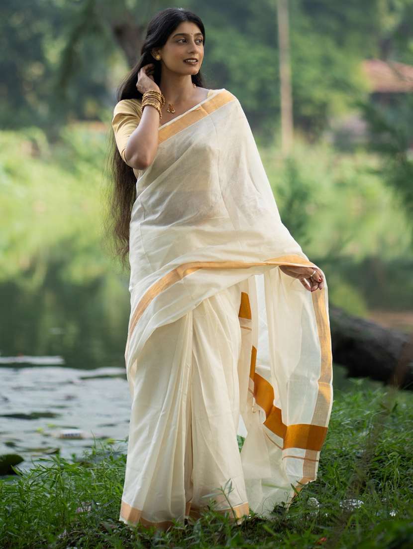 women solid with bordered kasavu saree with blouse