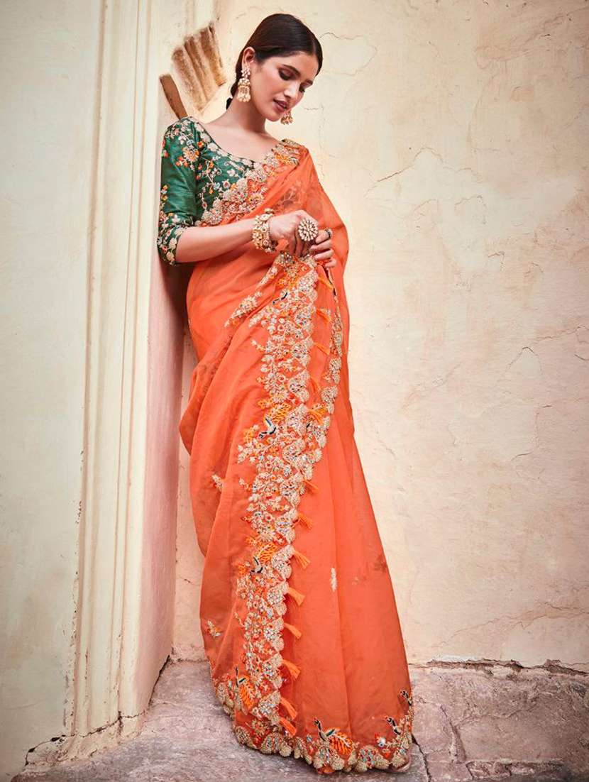 women solid with work embroidered saree with blouse