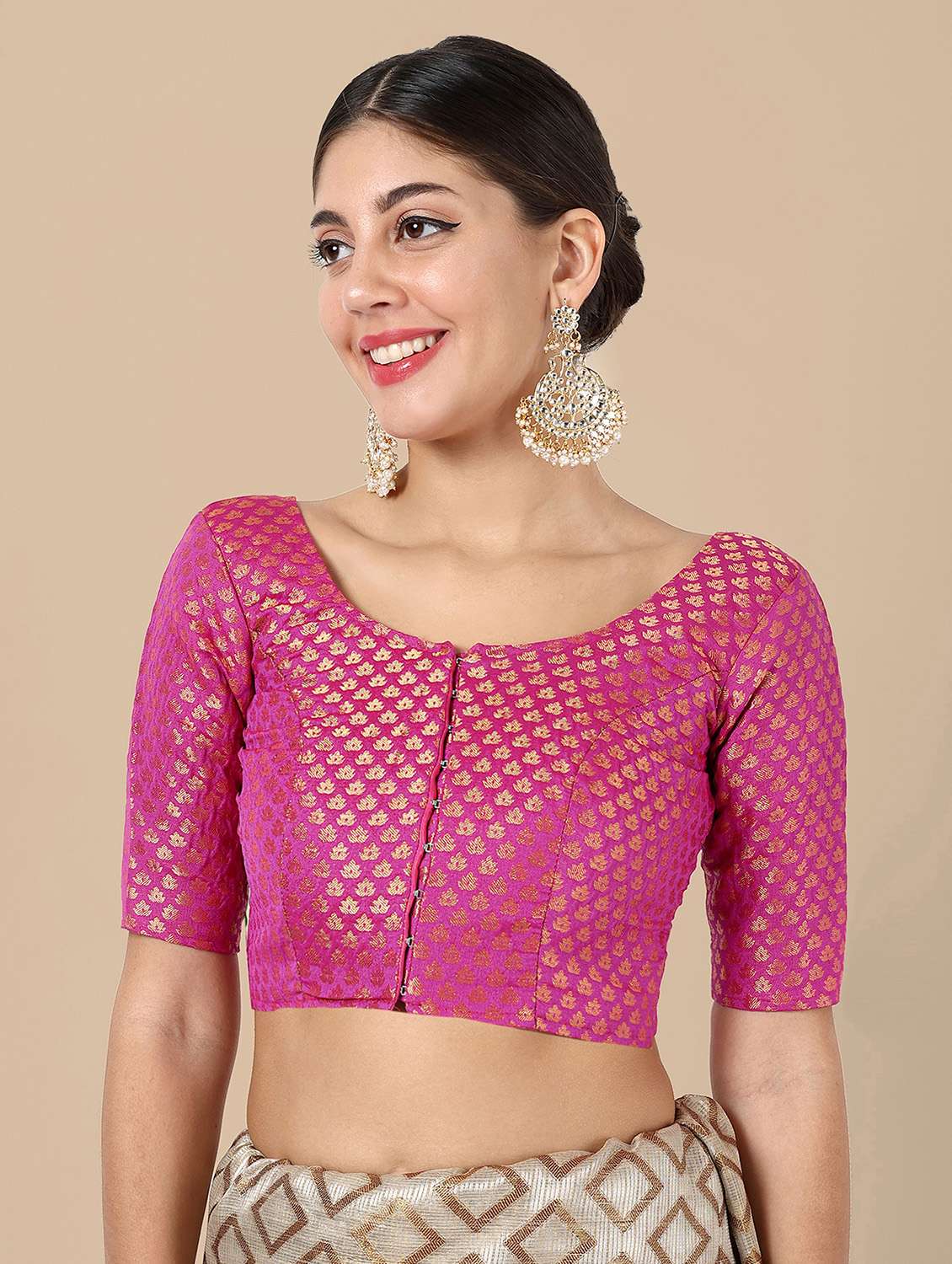 women self design round neck stitched blouse
