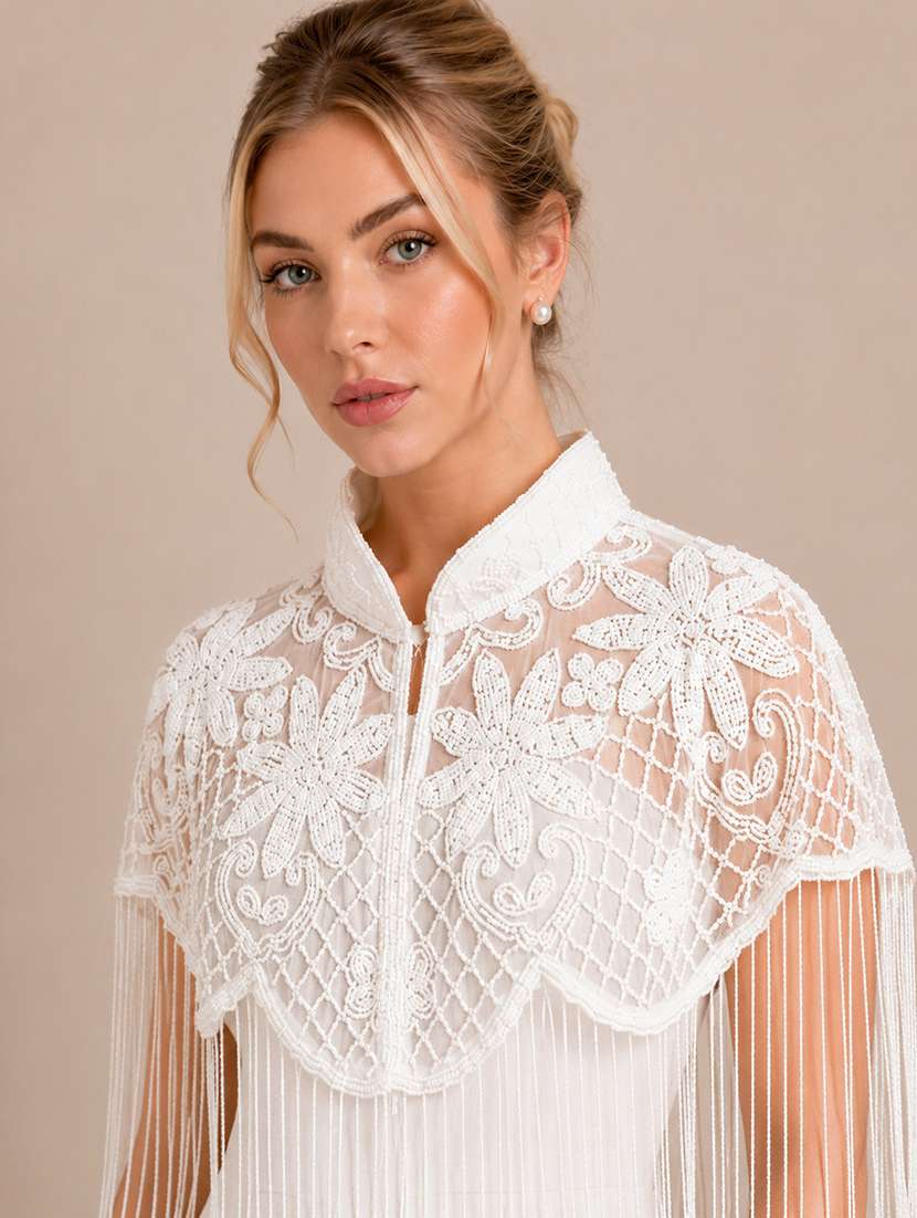 women embroidered cape with fringes - 22514917 -  Standard Image - 1