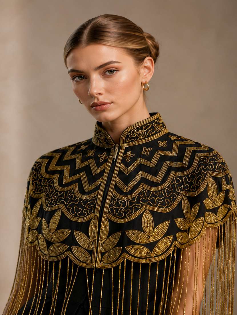 women embroidered cape with fringes - 22514918 -  Standard Image - 1