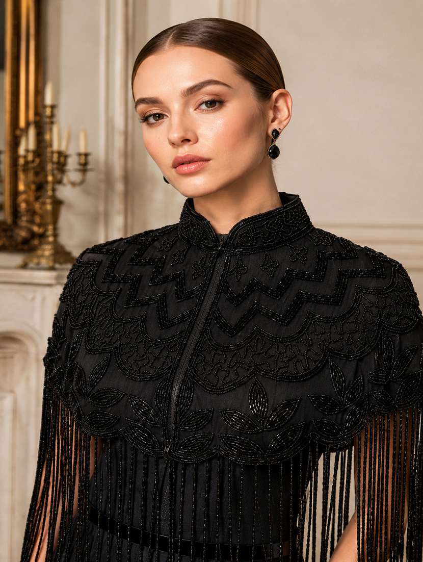 women embroidered cape with fringes - 22514919 -  Standard Image - 1