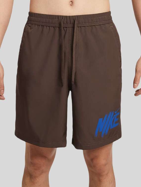 men solid mid rise sports shorts