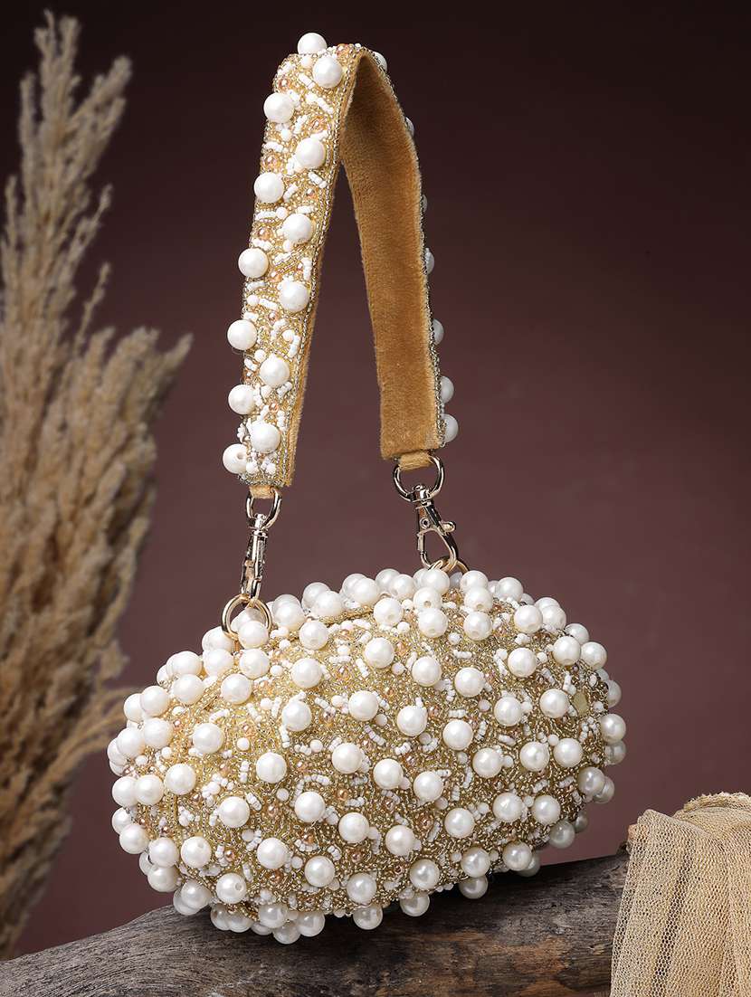 anekaant gold suede embellished party clutch with snap closure
