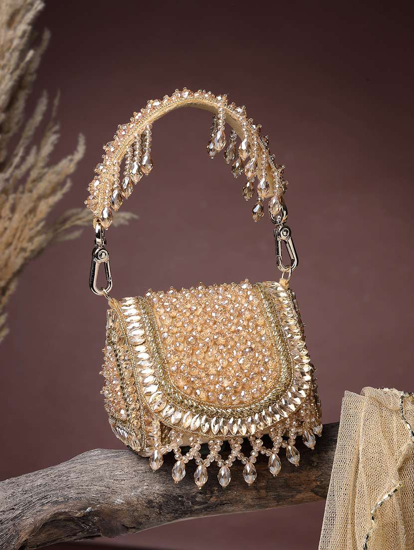 gold suede fold over embellished clutch with magnetic button closure