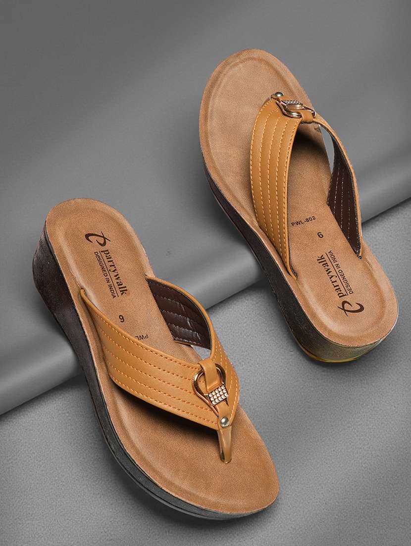 women tan toe separator wedge