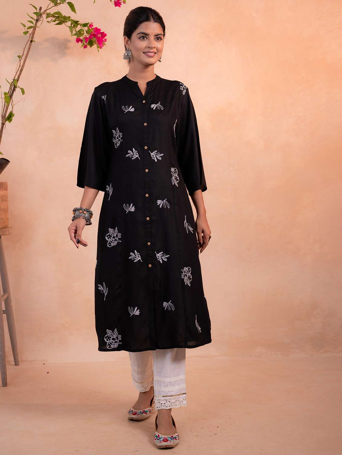 women embroidered three quarter sleeves a-line kurta