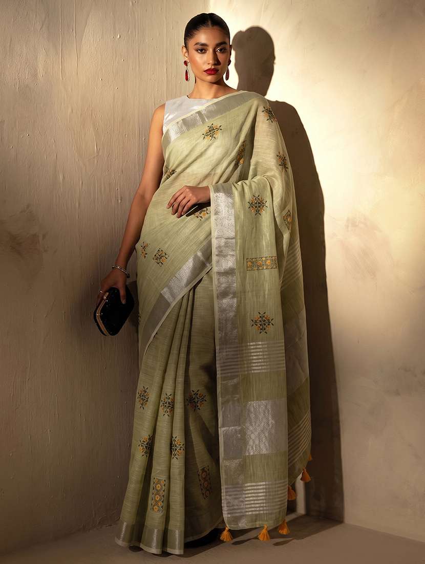 women solid with work embroidered saree with blouse