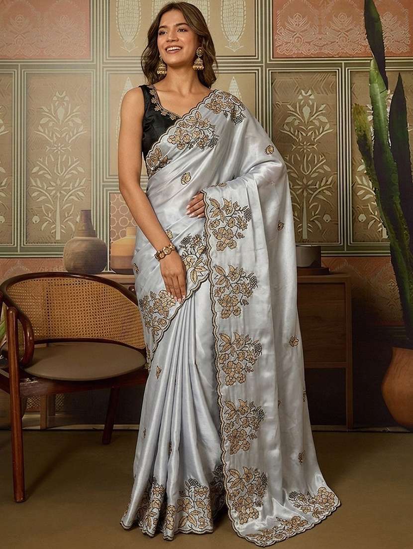 women solid with work embroidered saree with blouse