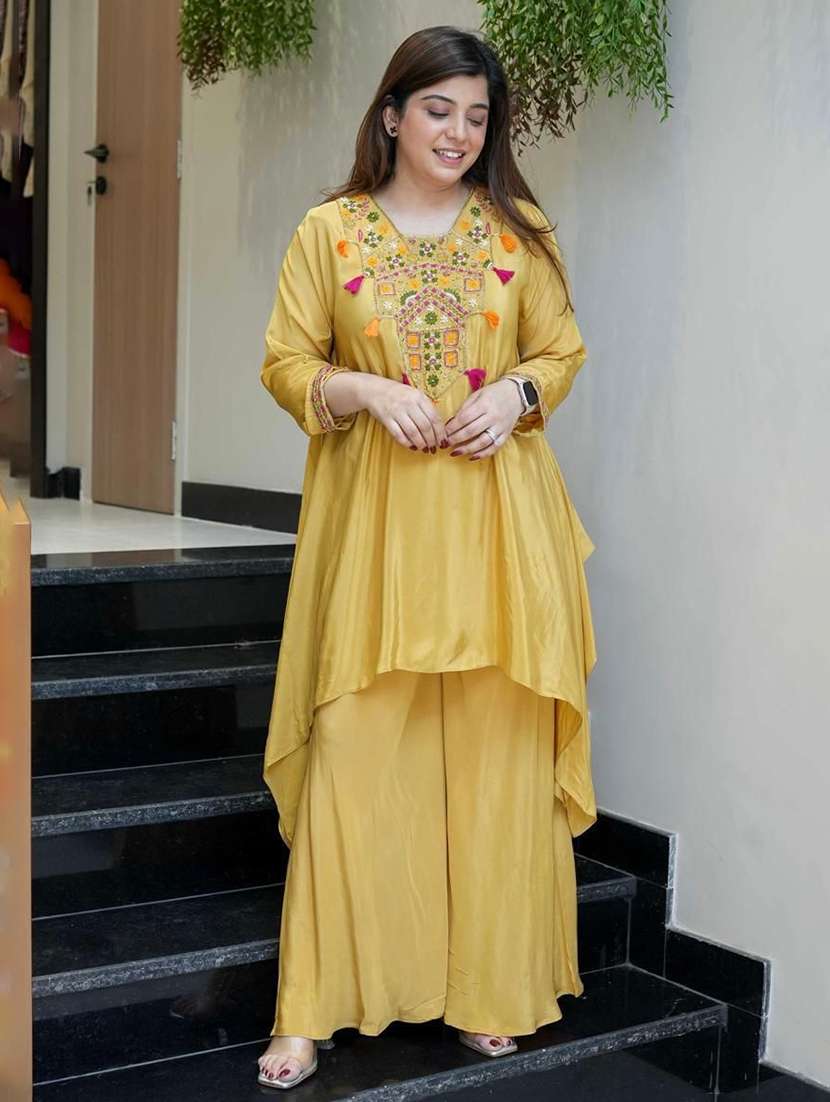 women embroidered three quarter sleeves kurta palazzo set 