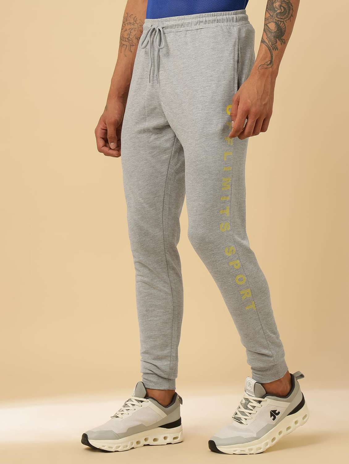 men typographic mid rise slim fit joggers - 22581764 -  Standard Image - 1