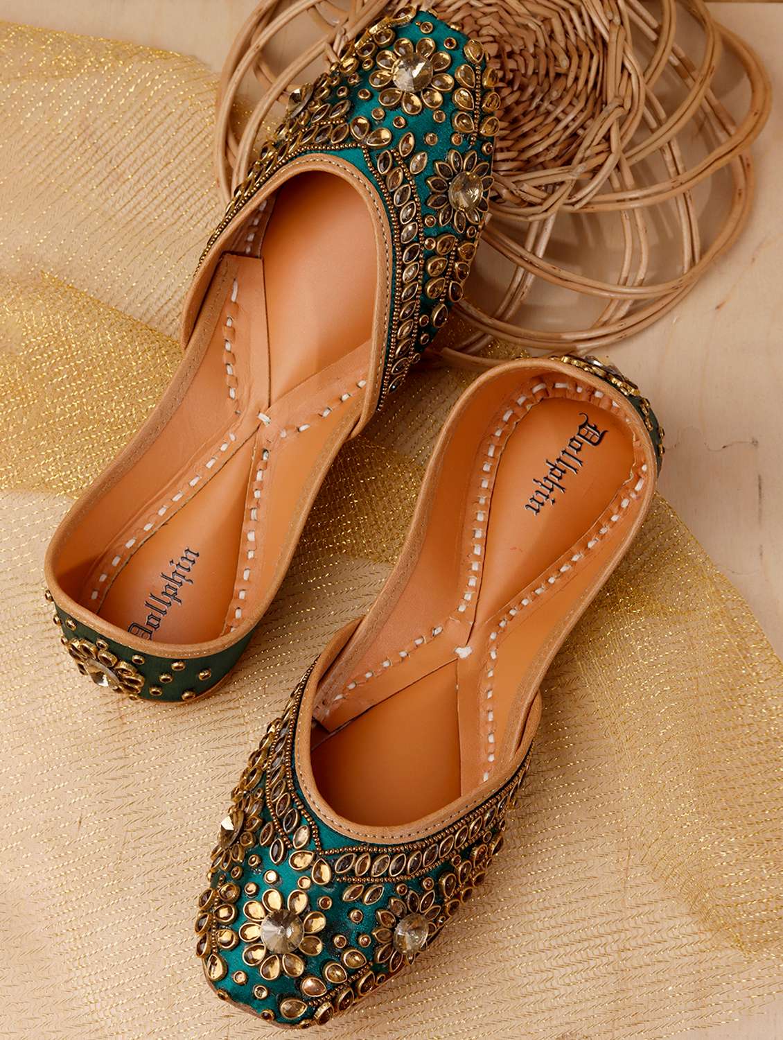 women embroidered slip on jutis