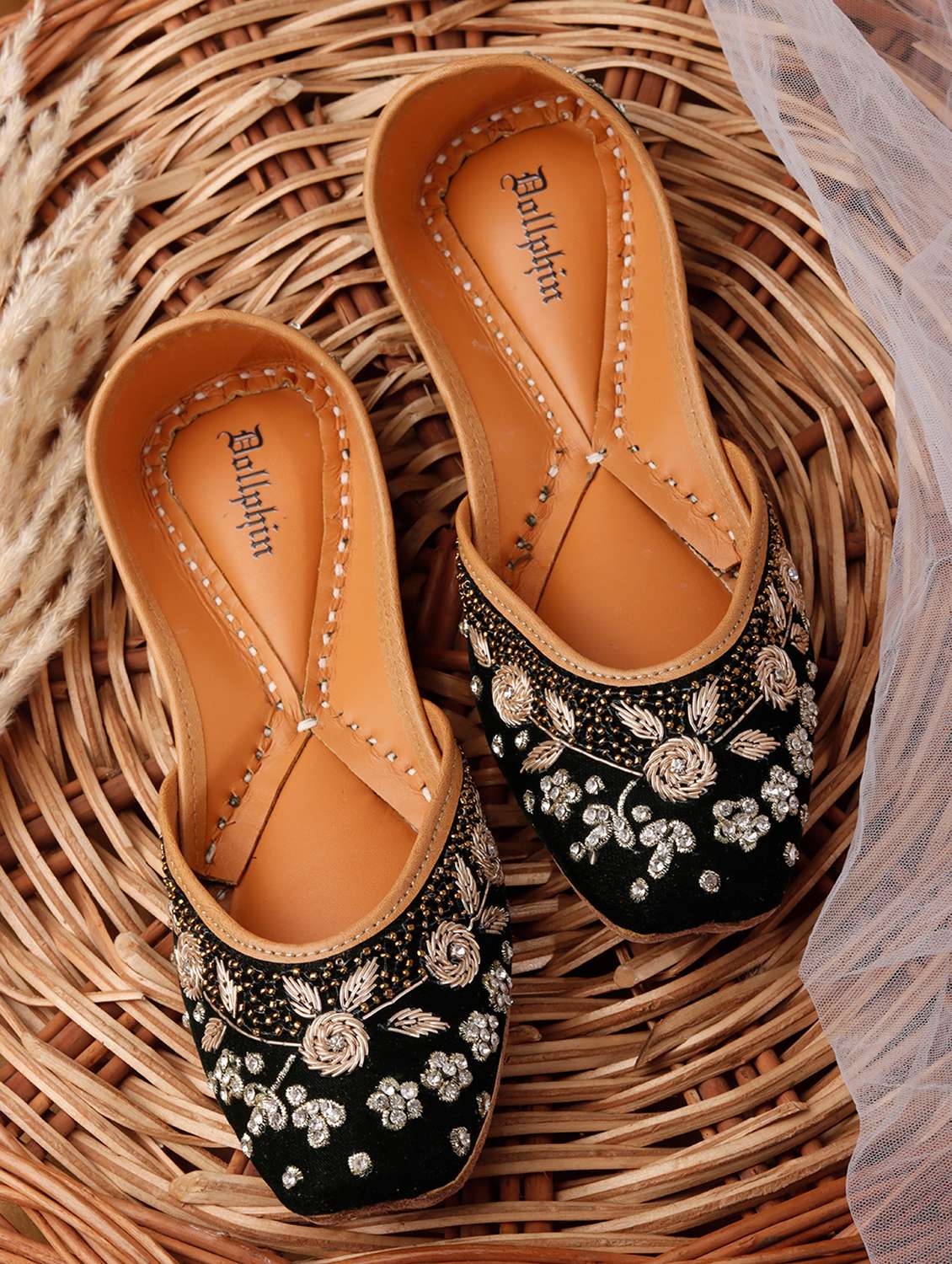 women embroidered slip on jutis
