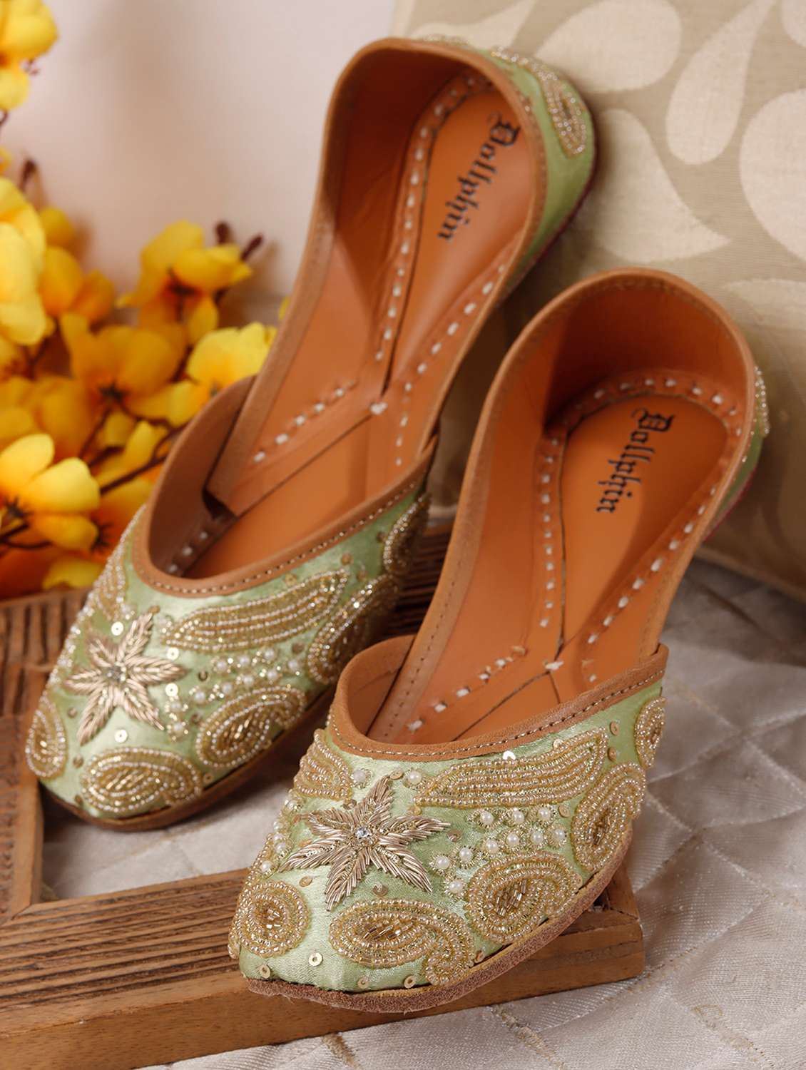 women embroidered slip on jutis