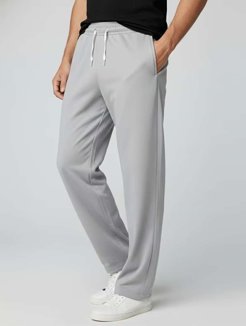 Men Solid Mid Rise Regular Fit Track Pant - 22588487 -  Standard Image - 1