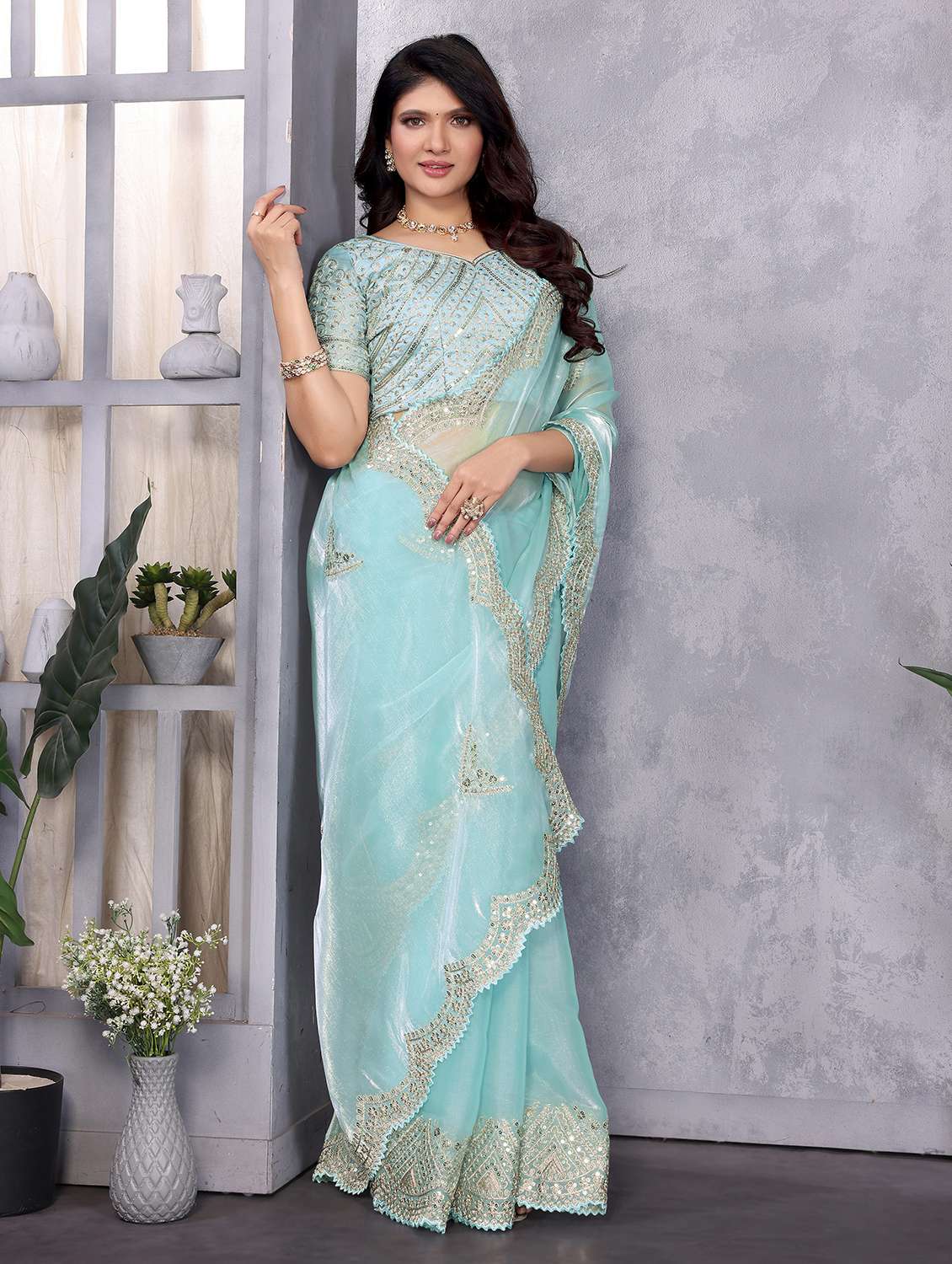 women solid with work embroidered saree with blouse