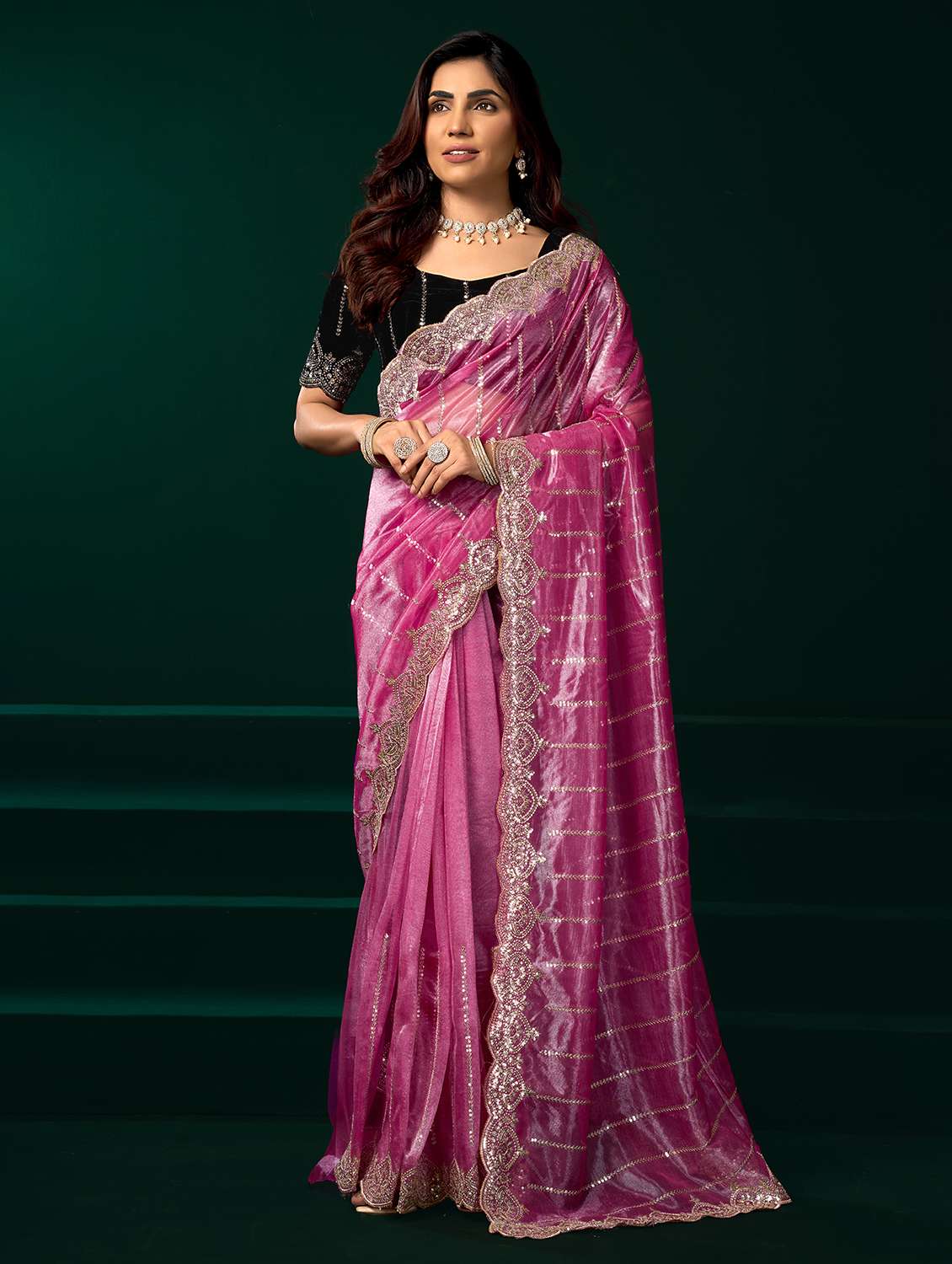 women solid with work embroidered saree with blouse