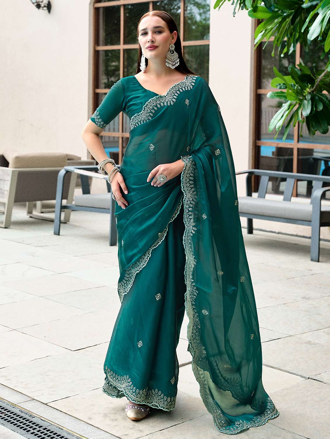 women solid with work embroidered saree with blouse