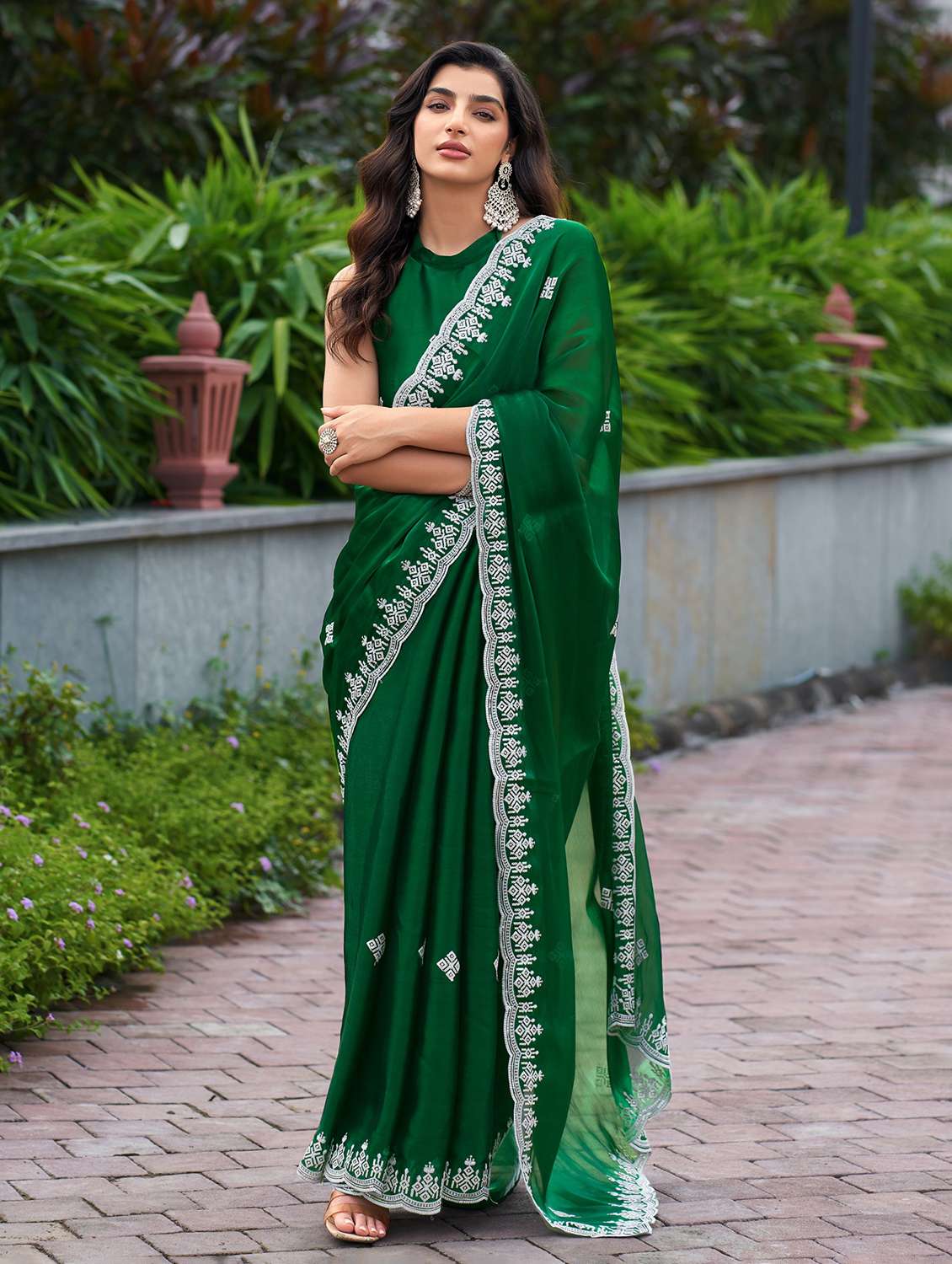 women solid with work embroidered saree with blouse