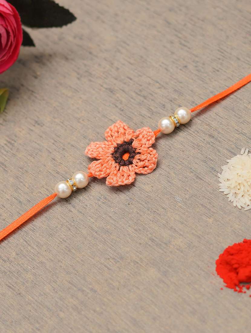 the magic wand trendy handcrafted crochet flower shaped rakhi - 22598262 -  Standard Image - 1
