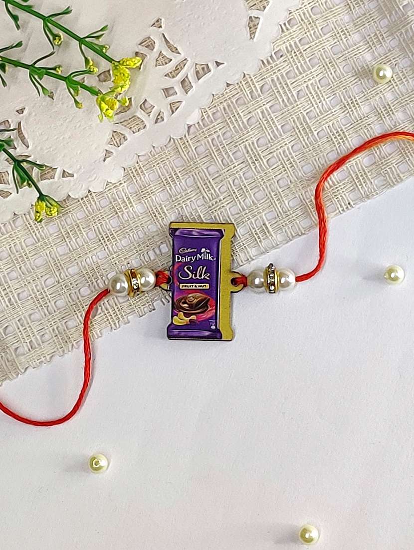 the magic wand trendy quirky dairy milk silk wooden rakhi - 22598322 -  Standard Image - 1