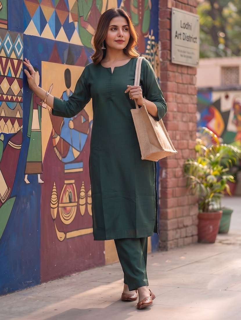 women solid three quarter sleeves kurta pant set