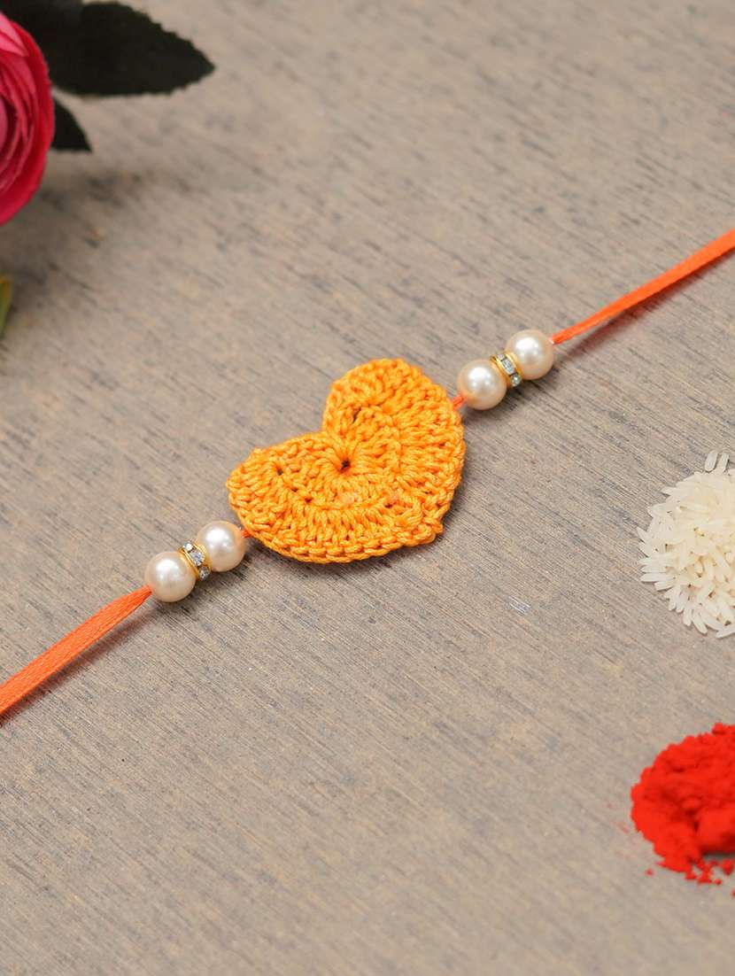 the magic wand cute heart applique pearl detailing handmade crochet rakhi - 22603843 -  Standard Image - 1