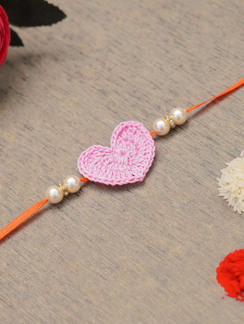 the magic wand cute heart applique pearl detailing handmade crochet rakhi - 22603845 -  Standard Image - 1