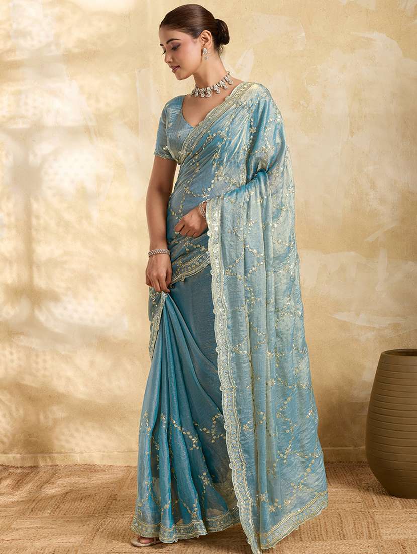 women solid with work embroidered saree with blouse
