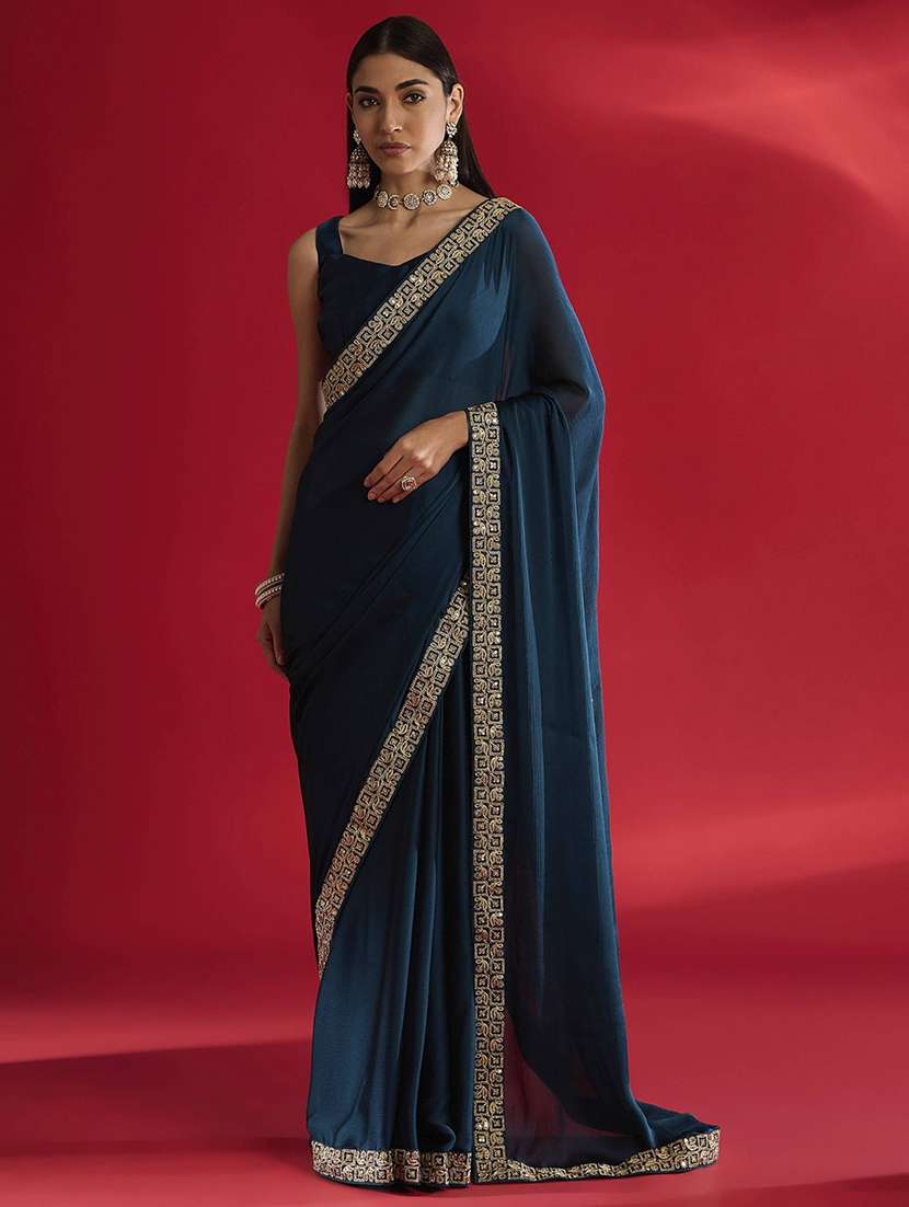 women solid with bordered saree with blouse
