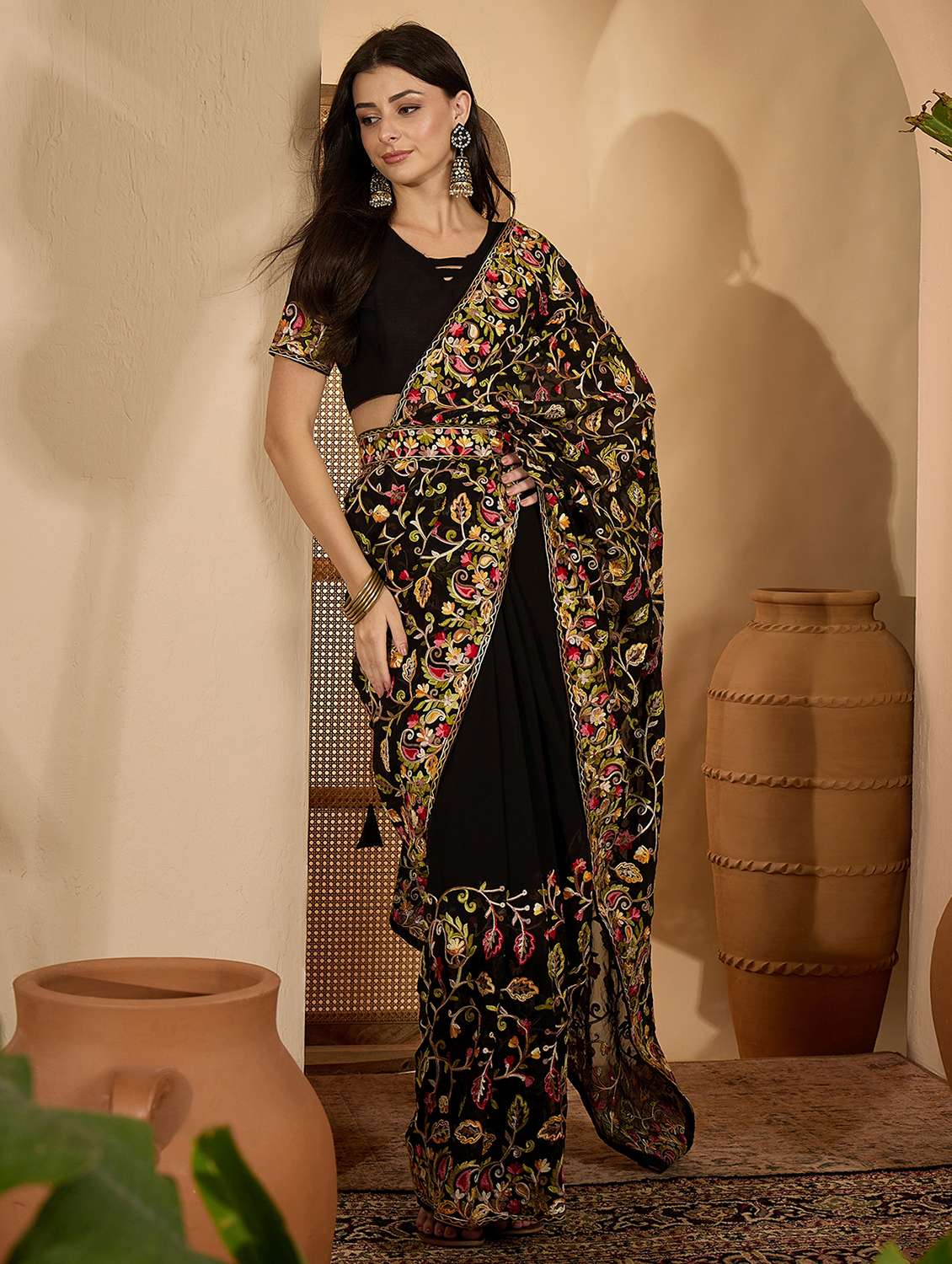women solid with work embroidered saree with blouse