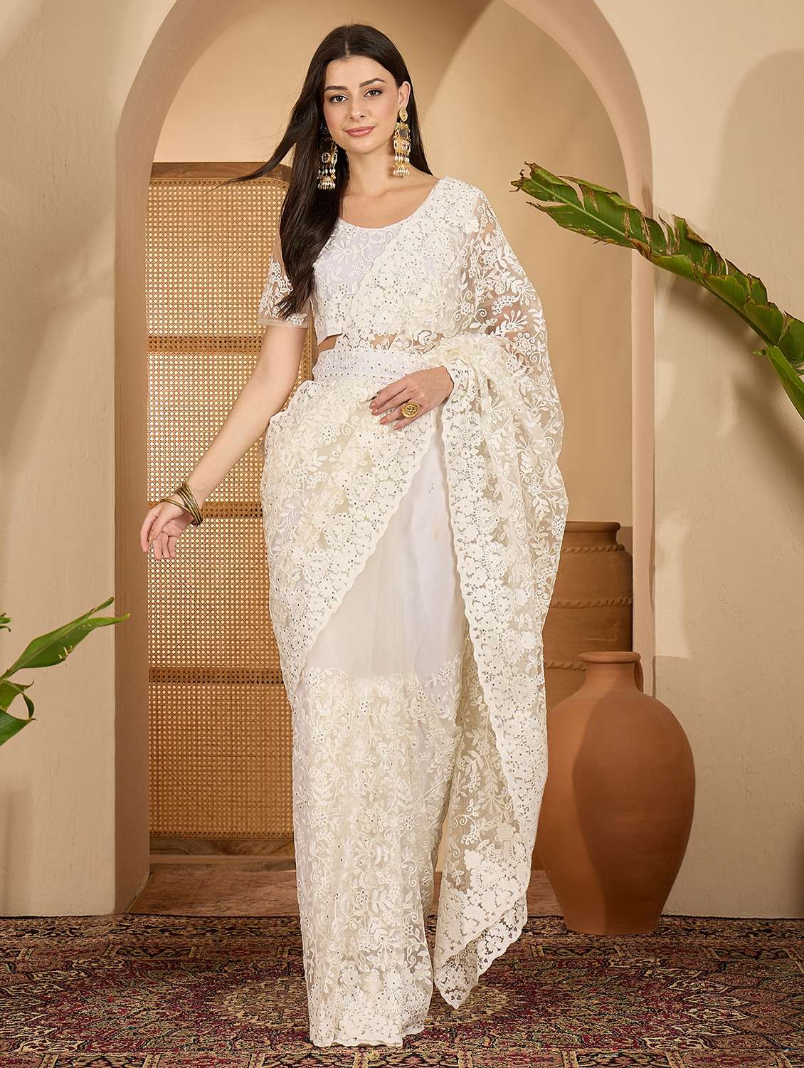 women solid with work embroidered saree with blouse