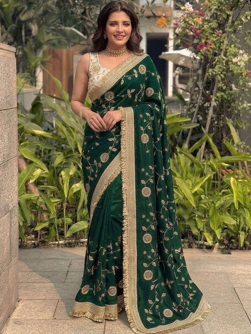 women solid with work embroidered saree with blouse