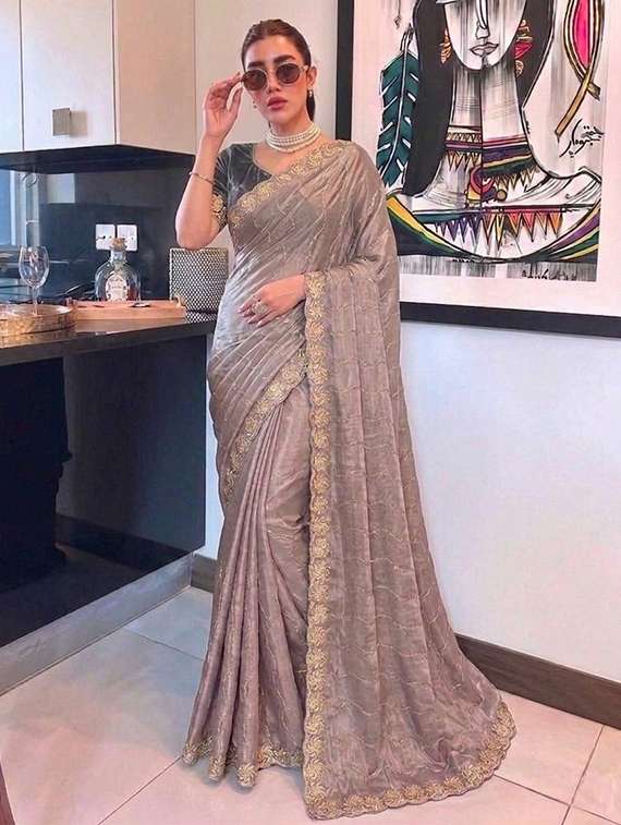 women solid with work embroidered saree with blouse